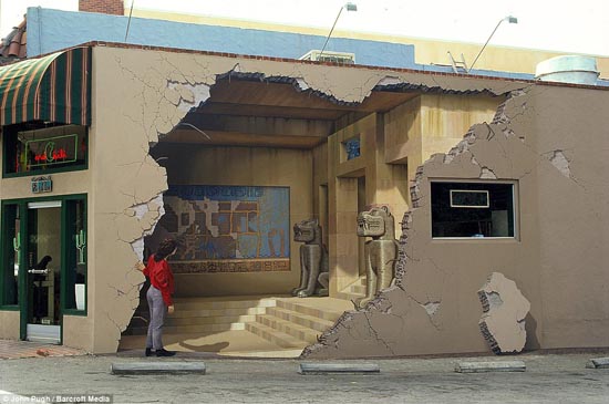 Treasure trove: An Egyptian style mural adorns a wall in Los Gatos, California. Pugh paints people into the mural to heighten the 3D effect